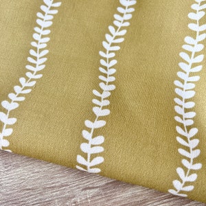 1425. ISABELLA TRAIL Soft Gold Reverse, tessuto 100% cotone, prezzo per 1/2 m