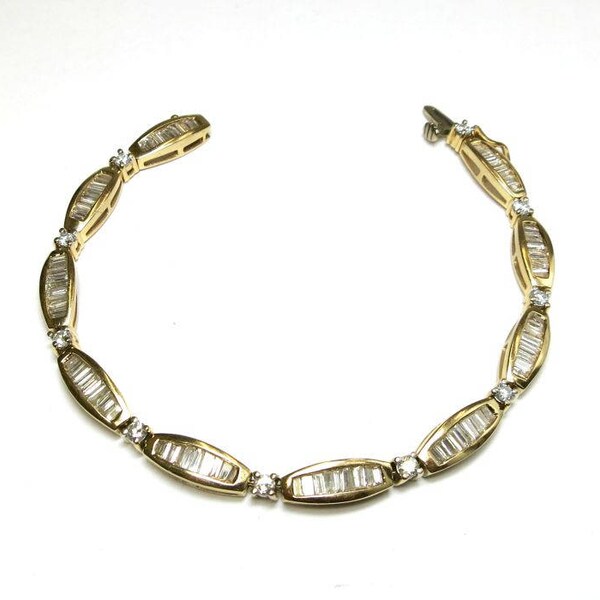 diamond tennis bracelet three carats yellow gold 14k