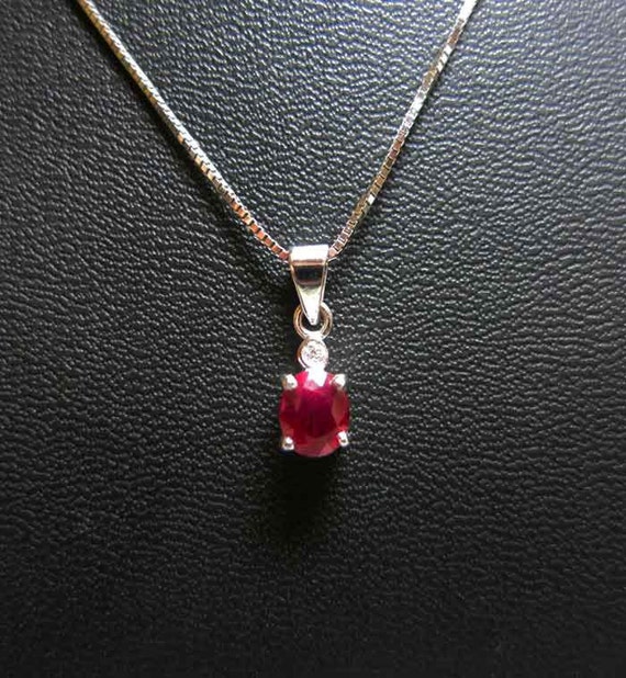 ruby oval in 18k white gold pendant