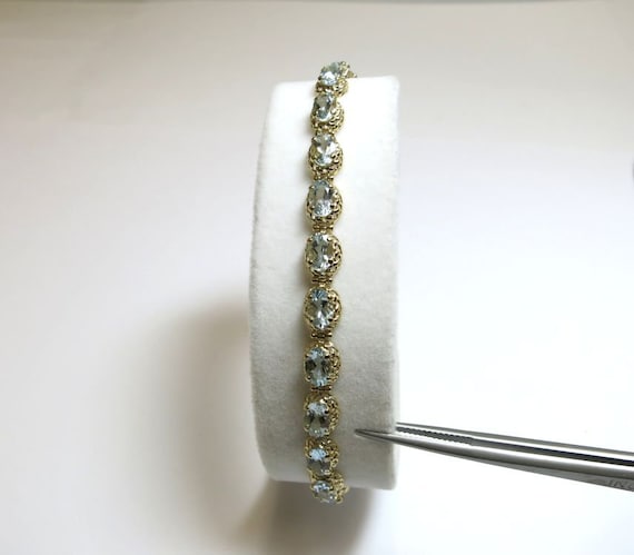 blue topaz bracelet 7 carats oval cut 14k yellow … - image 1