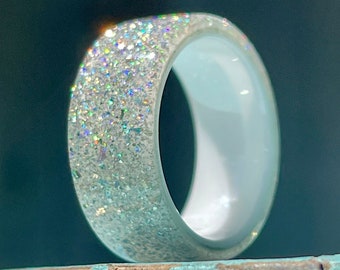 Moissanite DiamondCast Ring on a White Ceramic Band