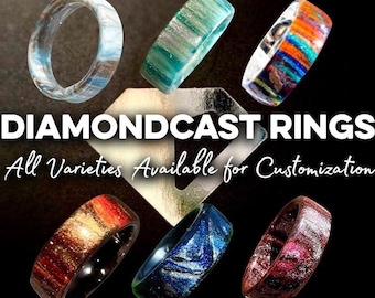 Op de afbeelding: Een assortiment Diamondcast-ringen in diverse kleuren, waaronder blauw, groen, rood en oranje. De ringen hebben unieke patronen en texturen. De tekst op de afbeelding luidt "Diamondcast Rings" en "All Varieties Available for Customization."