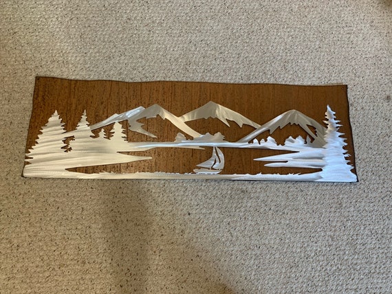 Lake Dillon in silver on the rustic brown background. Size 48x15