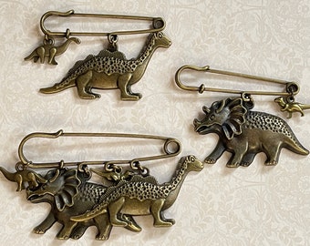 Dinosaur Kilt Safety Pin Brooch Jewelry - Brontosaurus, Triceratops, Tyrannosaurus or Raptor, and Stegosaurus Charms - Paleontologist Gift