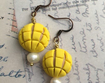 Yellow Conchita dangle earrings