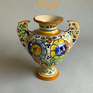 A stunning  Italian majolica winged vase