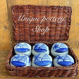 A super collection of ceramic hand painted pots with lids