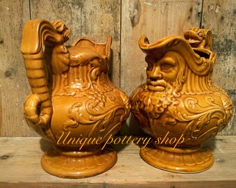 A huge and awesome pair of majolica jugs