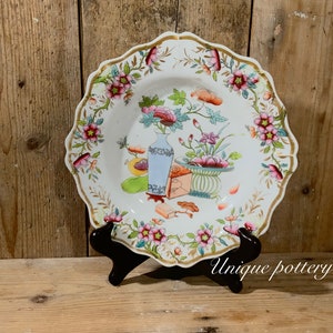 An English 19th c dessert or cabinet plate