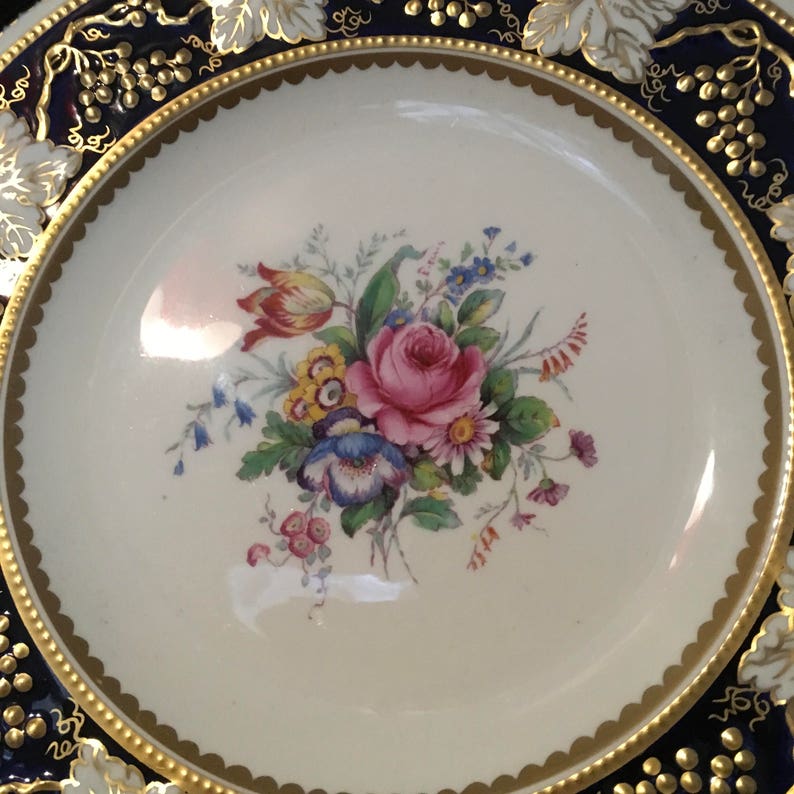 plate frame A very desirable royal crown derby vine cobalt 27cm plate in antique wooden