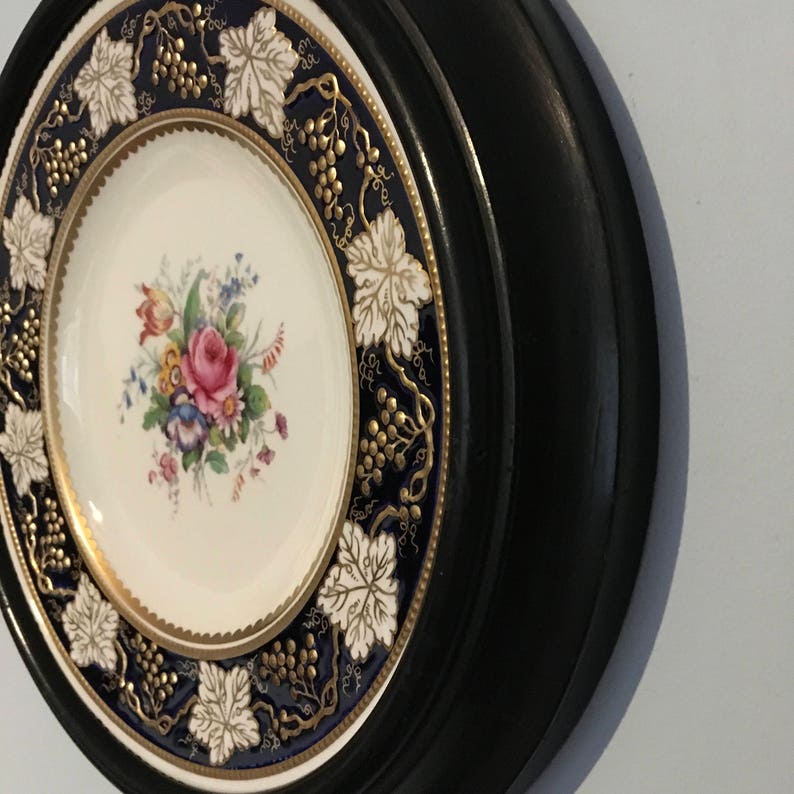 plate frame A very desirable royal crown derby vine cobalt 27cm plate in antique wooden