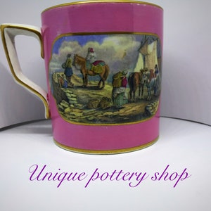 Una impresionante taza de cerámica antigua inglesa Pratt ware