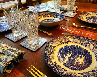 Een Engelse 20e eeuws vintage, transferware salade set