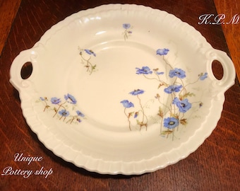 A stunning porcelain cake plate by K.P.M. Gerermy