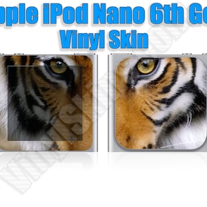 May include: A tiger's eye and stripes are featured on a vinyl skin for an Apple iPod Nano 6th generation.
