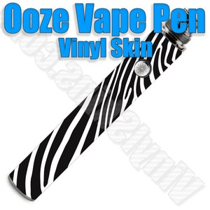May include: A black and white zebra print vinyl skin for an Ooze vape pen.