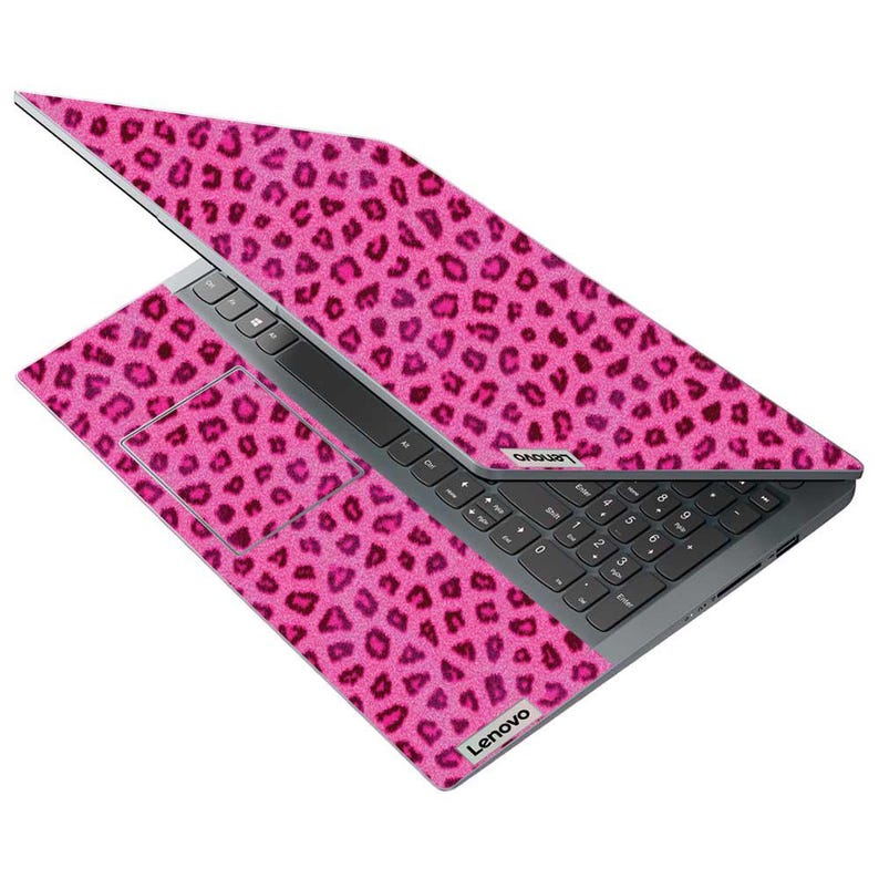 May include: A Lenovo laptop with a vibrant pink leopard print design. The laptop is open, displaying the keyboard, touchpad, and screen, all covered in the eye-catching pattern. The Lenovo logo is visible on the bottom and the screen bezel.