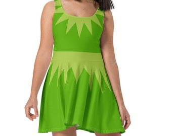 May include: A green skater dress with a yellow starburst design. The dress has a scoop neck and sleeveless design.