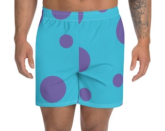 Puede incluir: Shorts deportivos azules con un patrón de lunares morados. Los shorts tienen una cintura elástica y un cordón.