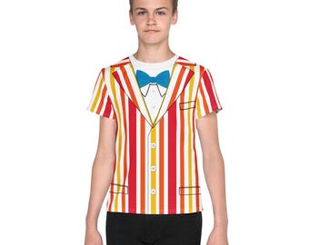 May include: A short-sleeved t-shirt featuring a colorful, vertical striped design in red, orange, and yellow. The shirt has a printed tuxedo-style front with a blue bow tie and white shirt collar. The shirt is worn by a person.