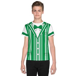 May include: A white t-shirt with a green and white striped pattern that looks like a tuxedo vest. The shirt has a green bow tie.
