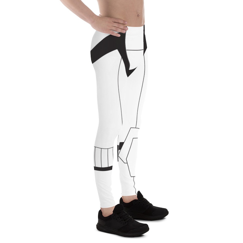 May include: White and black men's leggings with a graphic print of a stormtrooper. The leggings are made of a stretchy, comfortable fabric and are perfect for working out or just lounging around the house.
