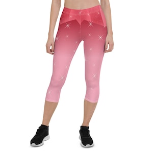 May include: Pink and red capri leggings with a gradient pattern and white star accents.