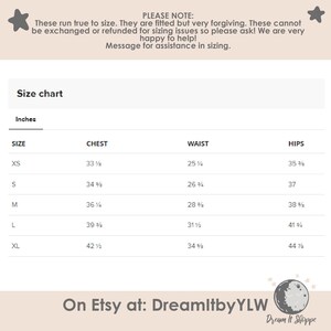 May include: Size chart for clothing in inches. The chart shows chest, waist, and hip measurements for sizes XS, S, M, L, and XL.