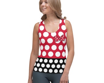 May include: Red tank top with white polka dots and a black and white polka dot bottom. The tank top has a red bow on the front.