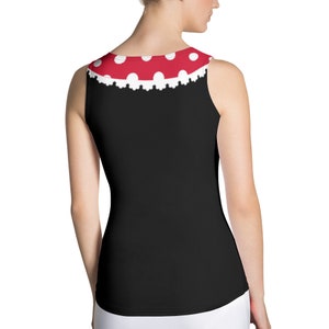 May include: Black tank top with a red and white polka dot trim around the neckline. The trim has a white lace design.