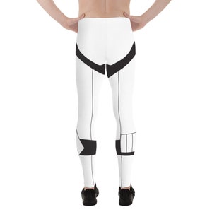 May include: White leggings with black geometric designs. The leggings have a white background with black lines and shapes.