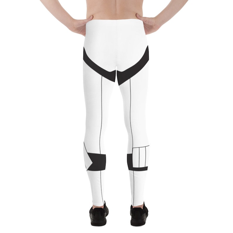 May include: White leggings with black geometric designs. The leggings have a white background with black lines and shapes.