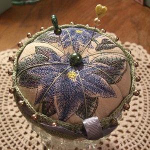 Machine Embroidered pin cushion with hand crocheted bottom