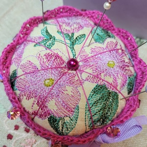 Machine Embroidered pin cushion with hand crocheted bottom