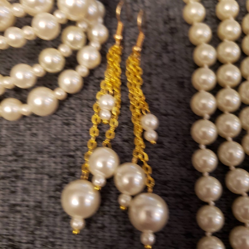 and multiple round bracelet Pearl necklace earrings