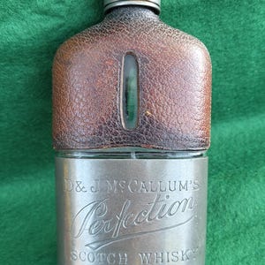 Scarce Vintage Scotch Whisky Flask. Vintage Glass, Pewter And Leather Scotch Whisky Flask - D & J McCallum&#39;s Perfection Scotch Whisky.
