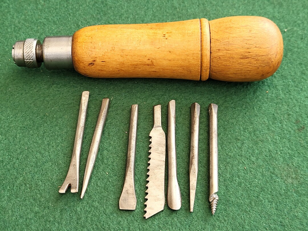 Antique Pad Tool. Antique Wooden Handle Pad Tool With Tool Attachments