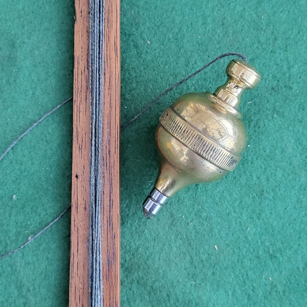 Antique Brass Plumb Bob. Antique Traditional Apple Shaped Brass Plumb Bob With Steel Tip. Traditional Apple Shaped Antique Plumb Bob.
