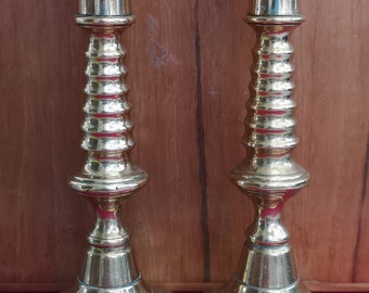 A Nice Pair Of Antique Brass Candlesticks. Pair Of Antique Brass Candlesticks With &quot;Push Up&quot; Candle Stub Ejectors.