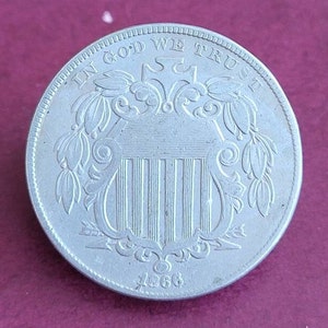 1866 Shield Nickel. 1866 USA 5 Cents. Antique American Coin. 1866 Shield Nickel - Repunched Date.