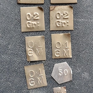 Set Of Antique Apothecary Weights. Set Of Eleven Antique Apothecary Weights In Original Box.