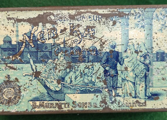 muratti blue cigarettes Scarce Antique Tobacco Tin. Antique Neb-ka Cigarettes Tin by B. Muratti &  Sons Co Limited. Antique Tobacco Advertising Tin