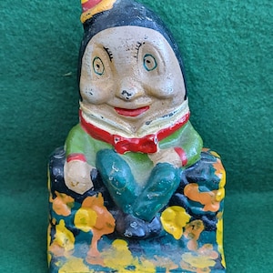 Vintage Cast Iron Humpty Coin Bank. Vintage Hand Painted, Cast Iron, Humpty Dumpty, Rustic Looking Coin Bank.