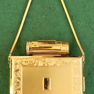Vintage Kigu All In One Powder Compact. Vintage Kigu Gold Tone Complete Party Compact, Cigarette Case And Powder And Lipstick Compact.