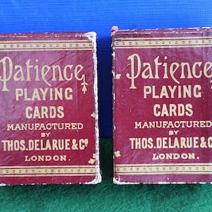 Antique De La Rue Playing Cards - Antique De La Rue Patience Playing Cards With The De La Rue Doily Ace Of Spades - Two Boxed Decks.