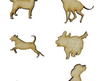May include: Six wooden cutout shapes of different dog breeds. The cutouts are brown and have a natural wood finish.