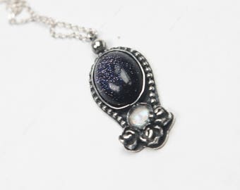 silver pendant with moonstone and black venturina