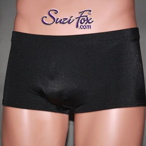 May include: Black spandex shorts with a smooth, shiny finish. The shorts have a wide waistband and a relaxed fit.