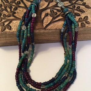Five strand wooden bead necklace with etched antique silvertone beads