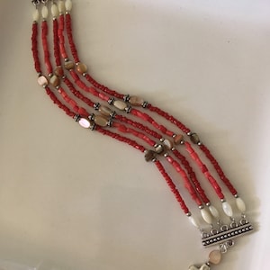 Five strand coral, mother of pearl and abalone shell bracelet with silvertone cross charm